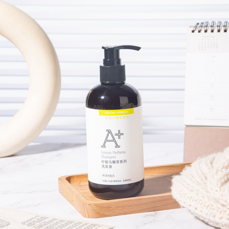 one bottle of AGRARIA hotel shampoo displayed on the tray.