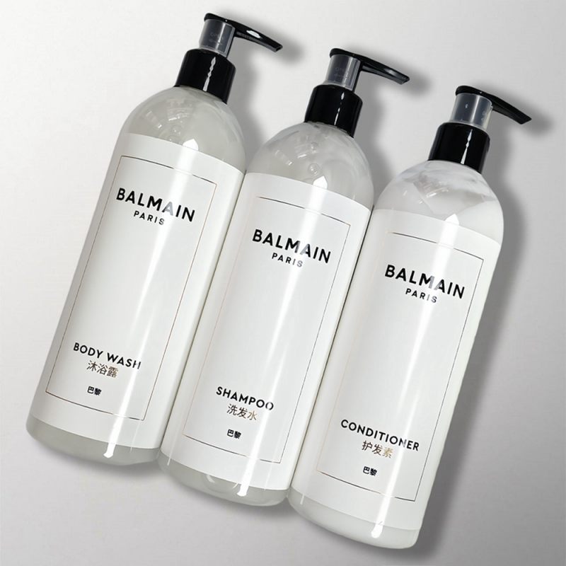 three Balmain hotel toileries.