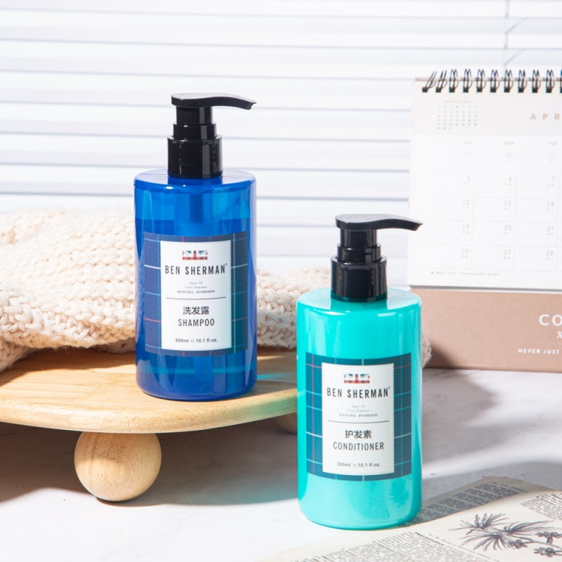 two bottles of BEN SHERMAN hotel shampoo and conditioner displayed.