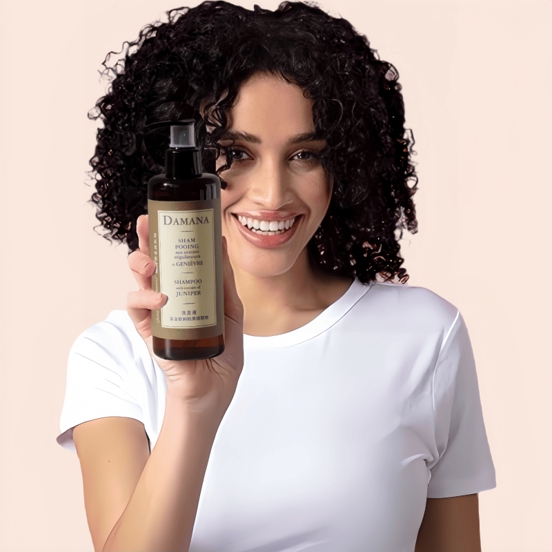 Woman holding hotel shampoo and smiling
