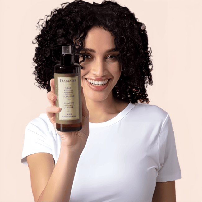 Woman holding hotel shampoo and smiling